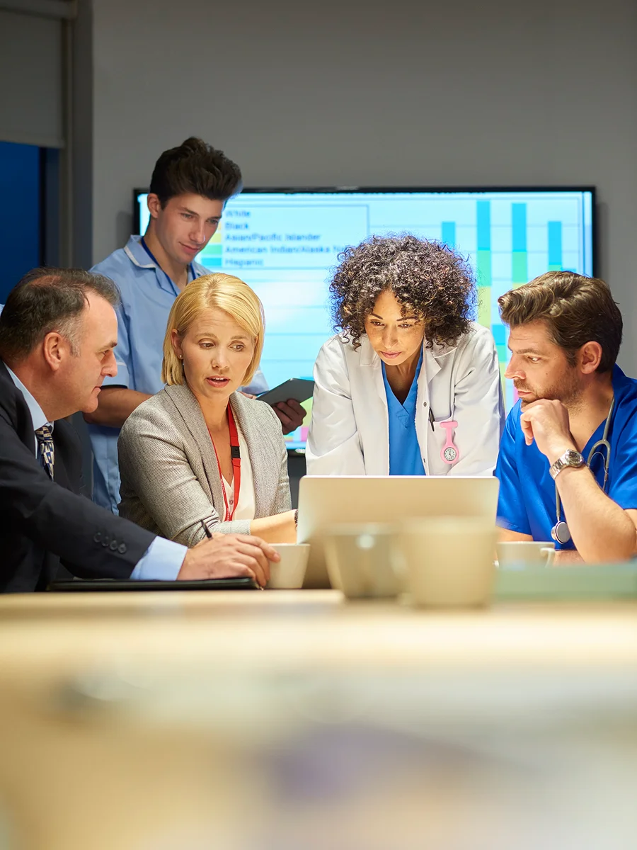 Medical team discussing patient cases